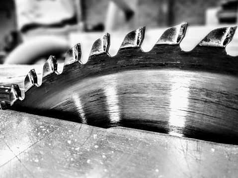 Circular saw in carpentry workshop or factory
