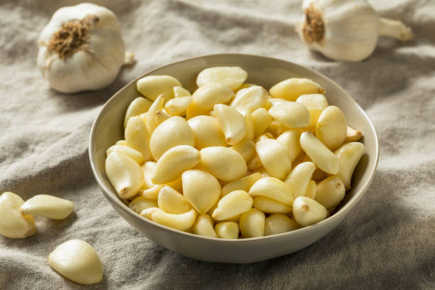 istock Raw Organic Peel Garlic Cloves 1068018778