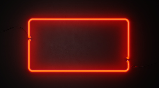 Rectangle red neon light on black wall. Horizontal composition with copy space.