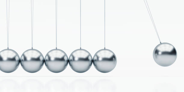 istock Silver Metal Newton's Cradle On White Background 1068019076