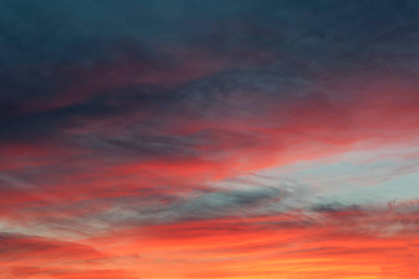 istock The sky with dark clouds illuminated by the setting sun 1068019570