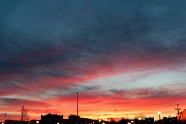 istock The sky with dark clouds illuminated by the setting sun 1068019578