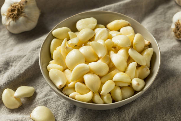 istock Raw Organic Peel Garlic Cloves 1068021606