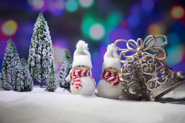 istock festive background. snowman dressed as Santa Claus with Christmas balls on light background photo has an empty space for your text 1068024682