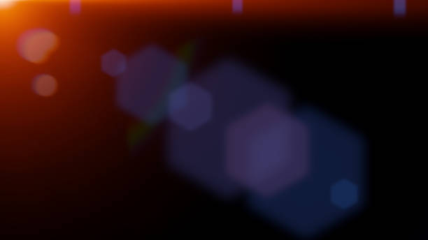 istock colorful flare effect overlay effect texture in hot orange and blue with hexagonal bokeh and light streaks in front of a black background 1068032014