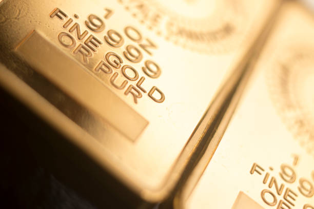 Gold bullion 999.9 purity solid one ounce ingot precious metal bars.
