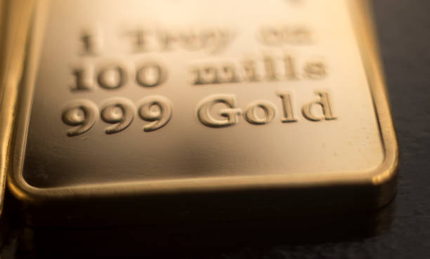 istock Gold bullion 999.9 purity solid one ounce ingot precious metal bars. 1068051176