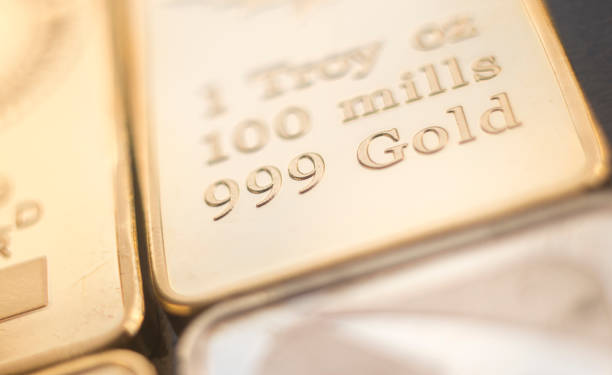 istock Gold bullion 999.9 purity solid one ounce ingot precious metal bars. 1068051266