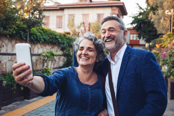 istock Tourist senior couple taking a selfie 1068066268
