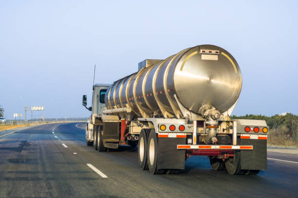 Tanker truck Tanker truck driving on the freeway fuel tanker stock pictures, royalty-free photos & images