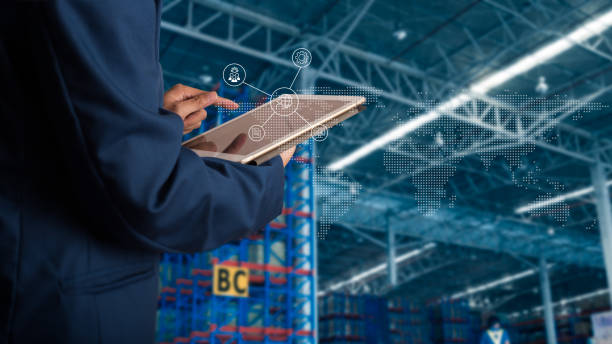 istock Businessman manager using tablet check and control for workers with Modern Trade warehouse global business commerce concept or import-export commercial logistic. Industry 4.0 concept 1068073618