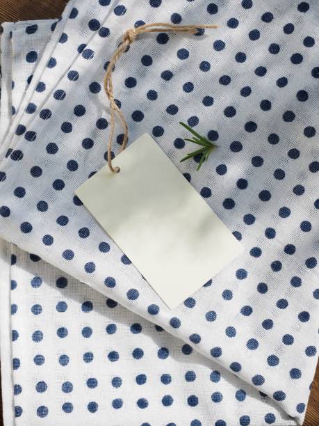 istock Clothing label, Cotton fabrics and rosemary 1068101290