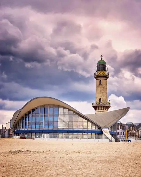 Photo of Teepott and lighthouse on the beach in Warnemünde.