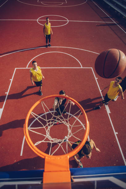 istock Men basketball match outdoors 1068104892
