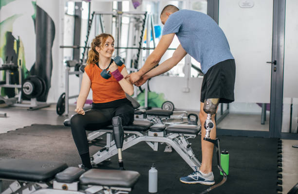 istock Disability couple training in gym 1068124788