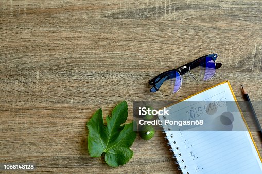istock 2019 goals on notebook on old wood table 1068148128