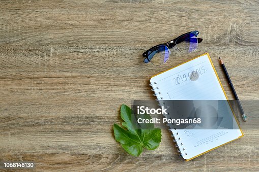 istock 2019 goals on notebook on old wood table 1068148130