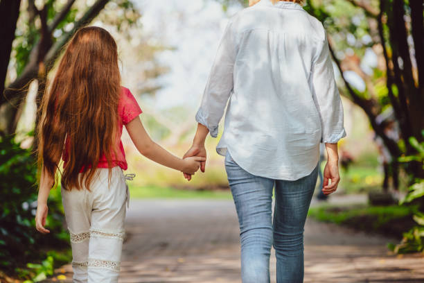 istock Mother and daughter in the park. 1068151856