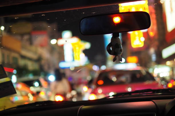 istock Inside view in the car night city street 1068155100