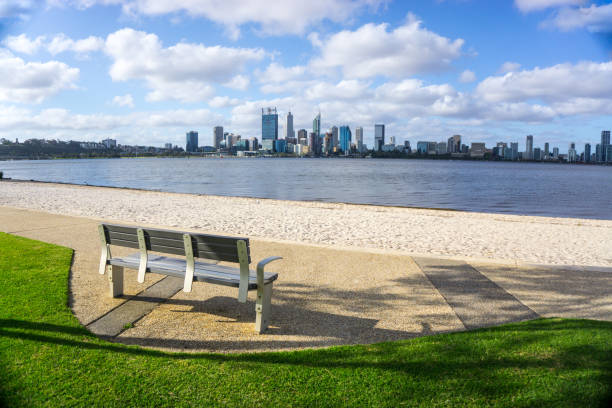 istock Wooden bench on the Swan River 1068163636