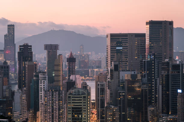 istock Sunset Hong Kong business district skyline 1068165212