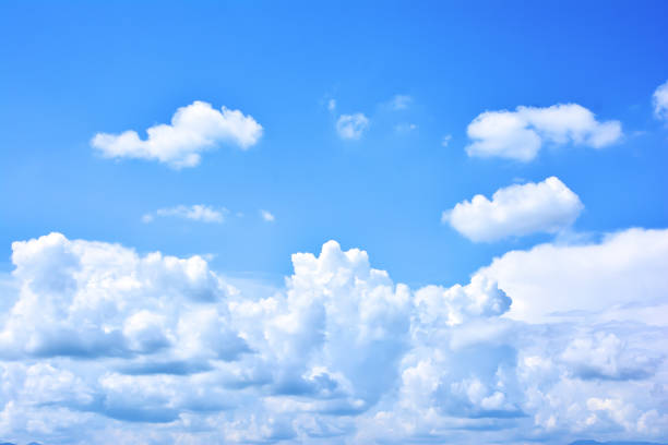 istock Beautiful blue sky with clouds background. Bright clouds in the blue sky 1068165548