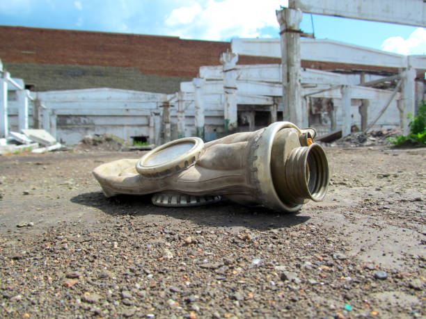 Dirty protection equipment on the empty ruined factory can be used as apocalypse symbol for a post apocalyptic concept.