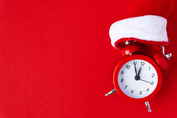 istock Creative flat lay vintage clock on red office table top view background concept alarm clock on red paper color with copy space in minimal style, empty template for text, break workplace at noon for lunch, back to school. 1068191726