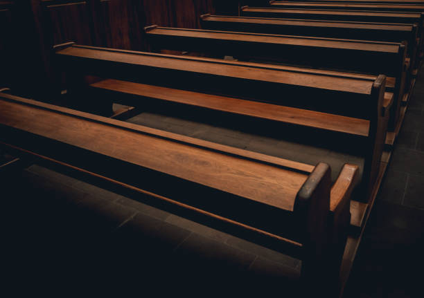 istock Rows of church benches. Selective focus. 1068200904