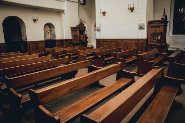 istock Rows of church benches. Selective focus. 1068201516