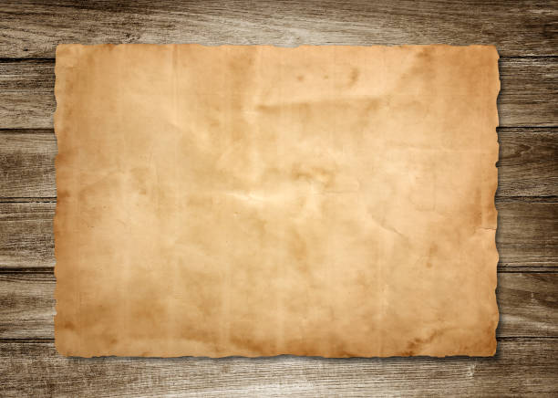 istock old paper on wood 1068204258