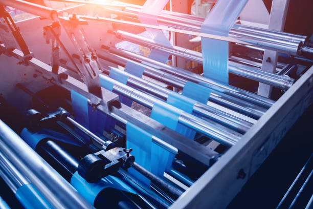 istock Modern automated production line in factory. Plastic bag manufacturing process 1068210828