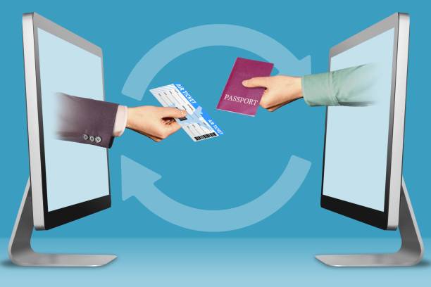 istock web concept, two hands from computers. air ticket and passport. 3d illustration 1068230184