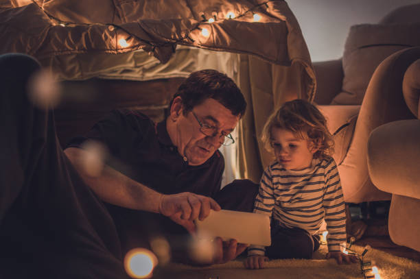 istock Enjoying in a tent with my grandfather 1068234178