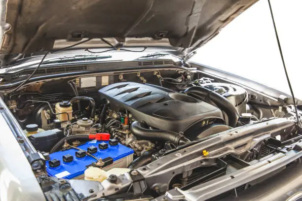 Photo of Open hood on 2500 cc. diesel turbo engine pickup truck in detail, Backgrounds