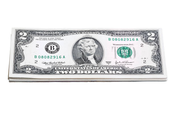 istock Stack of two dollars U.S. bills. Made an angle end isolated. 1068243698