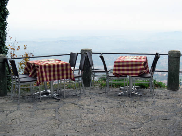 istock Restaurant on the mountain, two empty tables, fog, horizon 1068254488