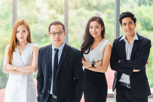 istock Asian Business Team Standing Portrait Successful company workers 1068261280