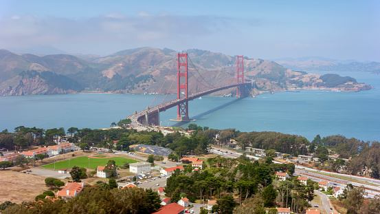 Aerial view of the Golden Gate Bridge viewed from the Presidio in the city of San Francisco, California, USA.