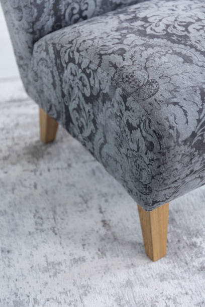 istock Close-up on patterned chair on grey carpet in elegant bedroom interior. Real photo 1068271648