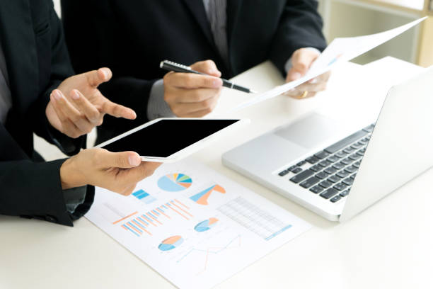 istock Business businessman work on the table use computer and tablet 1068273234