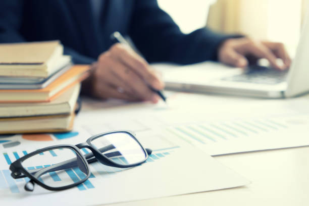istock Business businessman work on the table use computer and tablet 1068273288