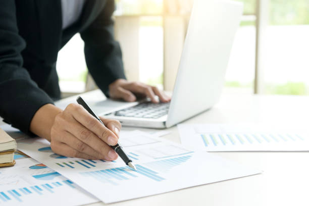 istock Business businessman work on the table use computer and tablet 1068273292