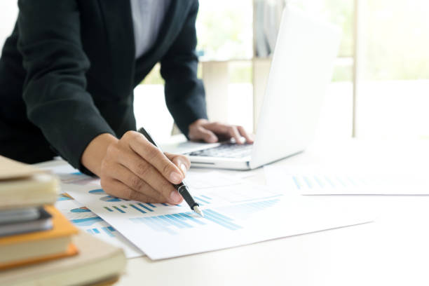 istock Business businessman work on the table use computer and tablet 1068273294