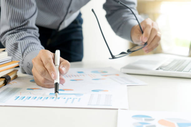 istock Business businessman work on the table use computer and tablet 1068273296