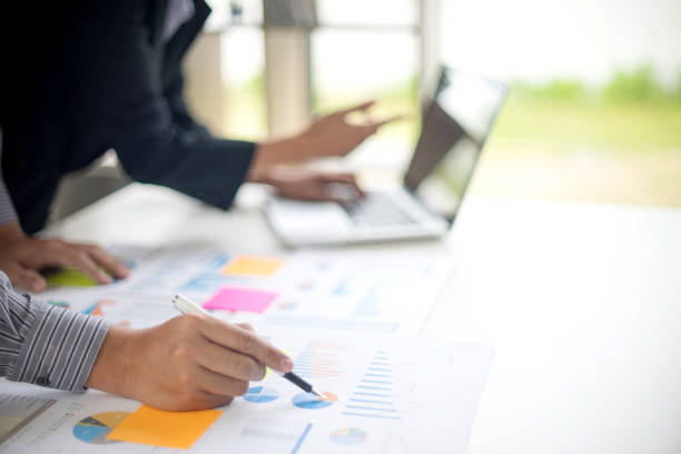 istock Business businessman work on the table use computer and tablet 1068273302