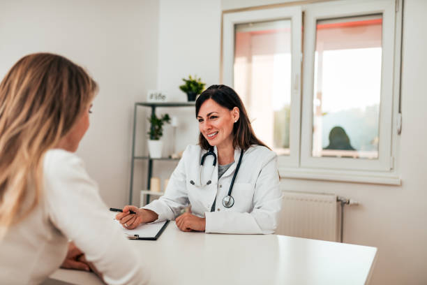 istock Girl at doctor's office. 1068273336