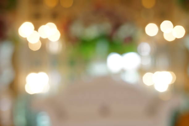 istock Defocused light and background with light spots of wedding decoration 1068274474