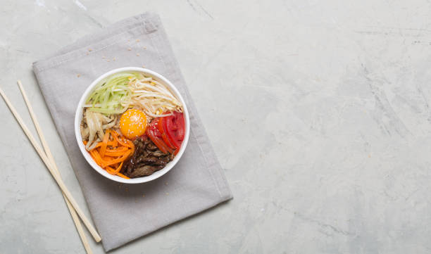 istock Traditional Asian Bibimbap dish with rice and vegetables 1068278836