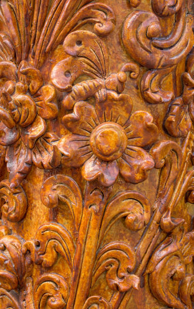 istock Pattern of flower carved on wood background. Traditional Thai style pattern 1068294820